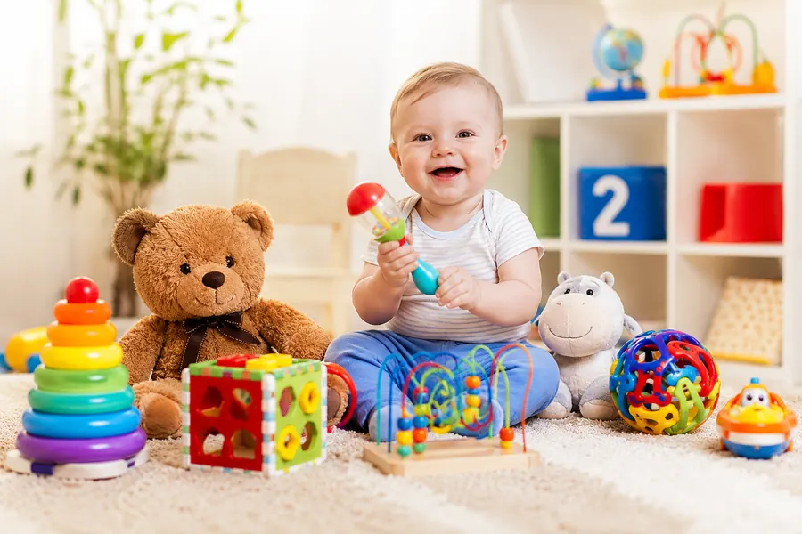 Baby playing with toys